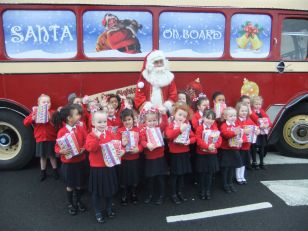 Primary 1 Visit Santa on his bus!