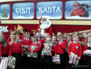 Primary 2 visit Santa on his bus
